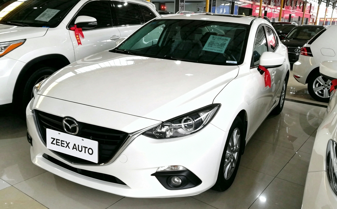 Mazda3 Axela 2014 Vehicle Profile: 5.8L/100km Sports Compact Sedan