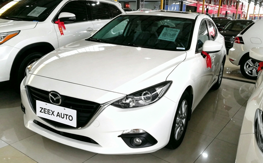 Mazda3 Axela 2014 Vehicle Profile: 5.8L/100km Sports Compact Sedan